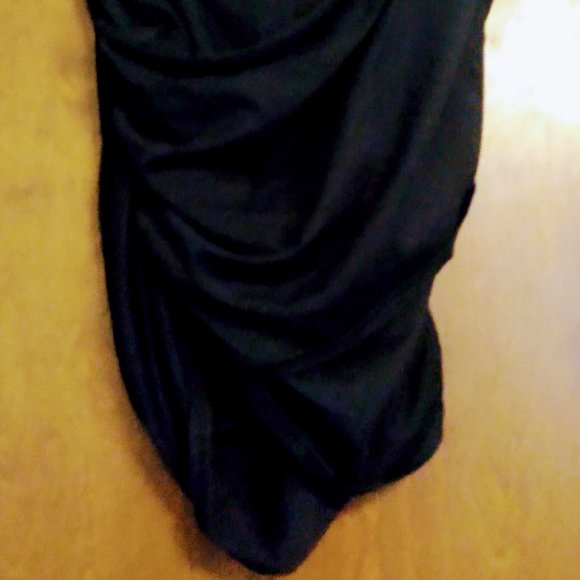 2 black magician assistant style skirts is what I call them. - Picture 2 of 4